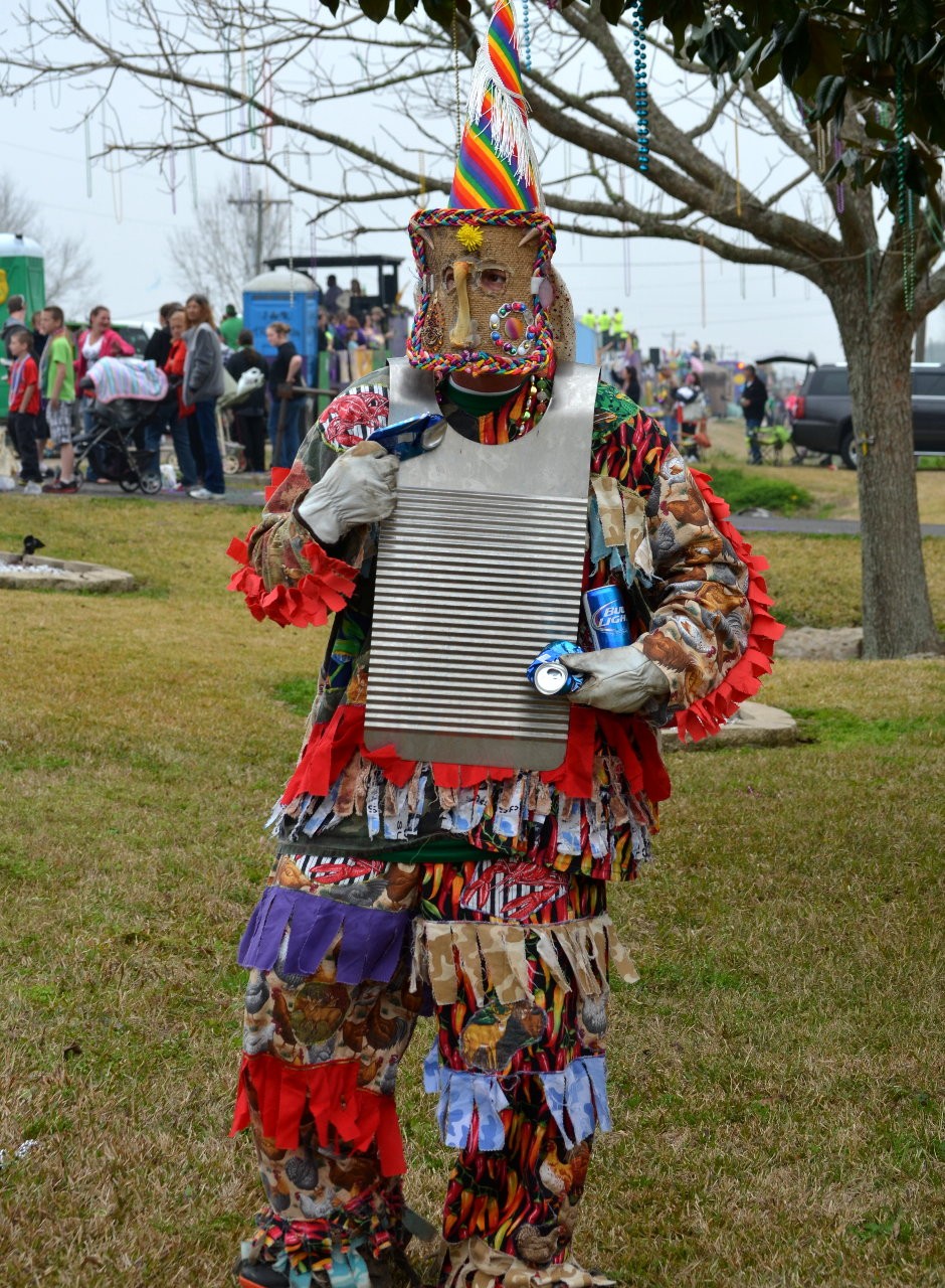 Runner playing washboard with crushed beer cans!  How original!