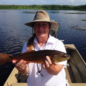 Bayou Woman with red drum